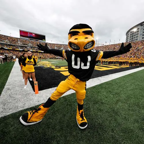 I-Club Membership mascot posing